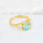 Cushion Fire Opal Round Side Stone Three-Stone Engagement Ring - Additional view