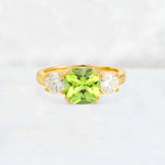 Cushion Peridot Round Side Stone Three-Stone Engagement Ring - Additional view