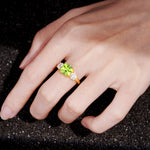 Cushion Peridot Round Side Stone Three-Stone Engagement Ring - Additional view