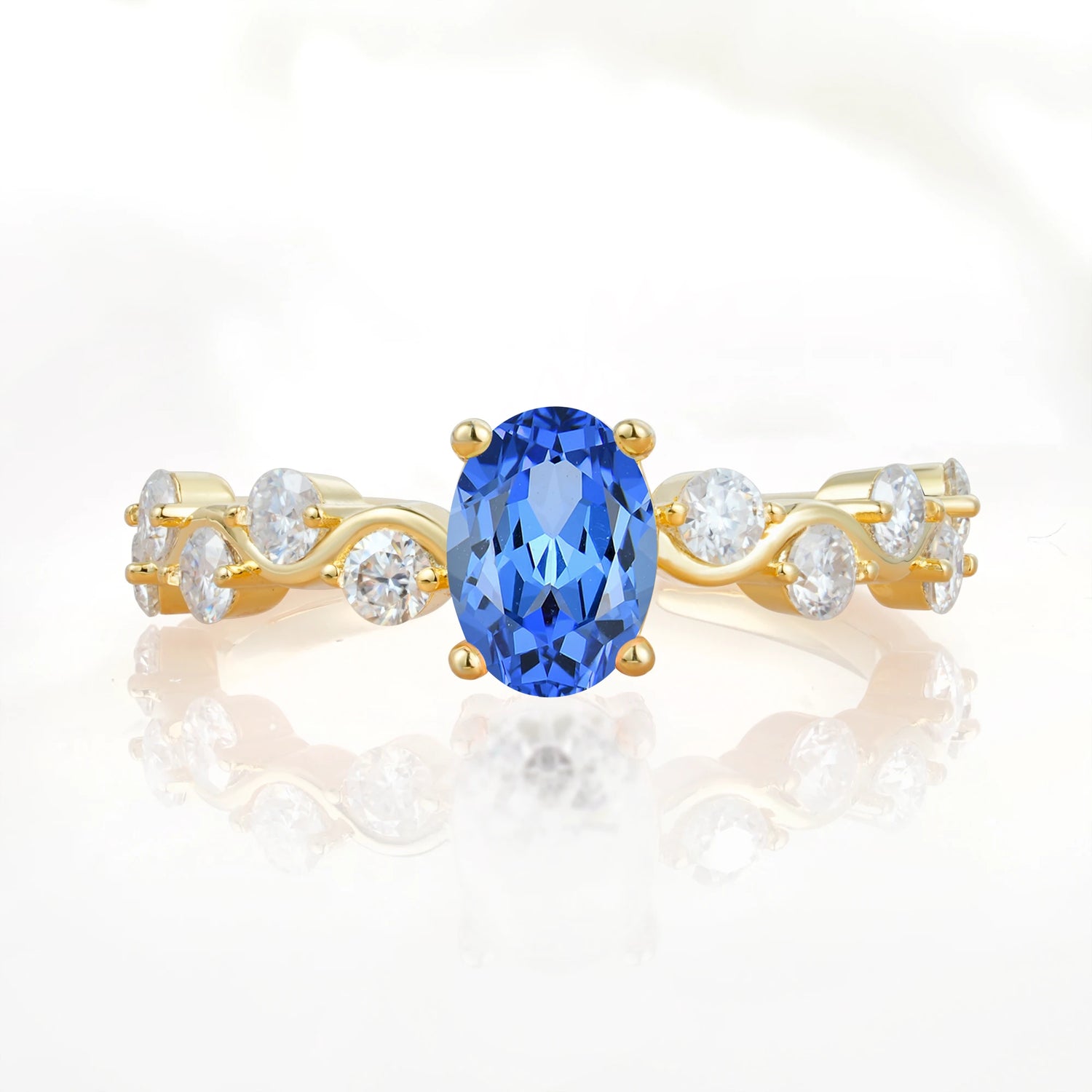 Unique Oval Sapphire Ring with Pave Set Stones