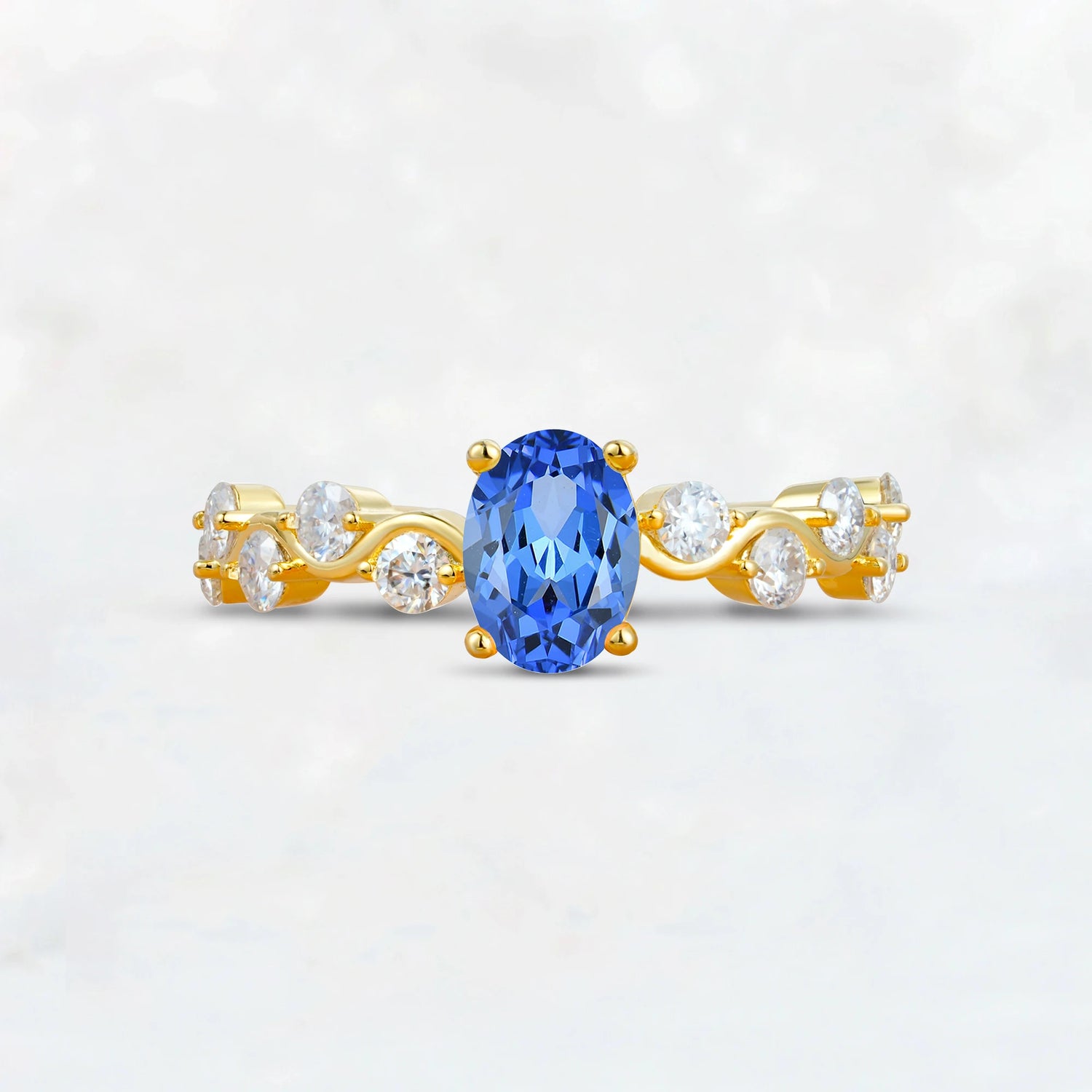 Unique Oval Sapphire Ring with Pave Set Stones