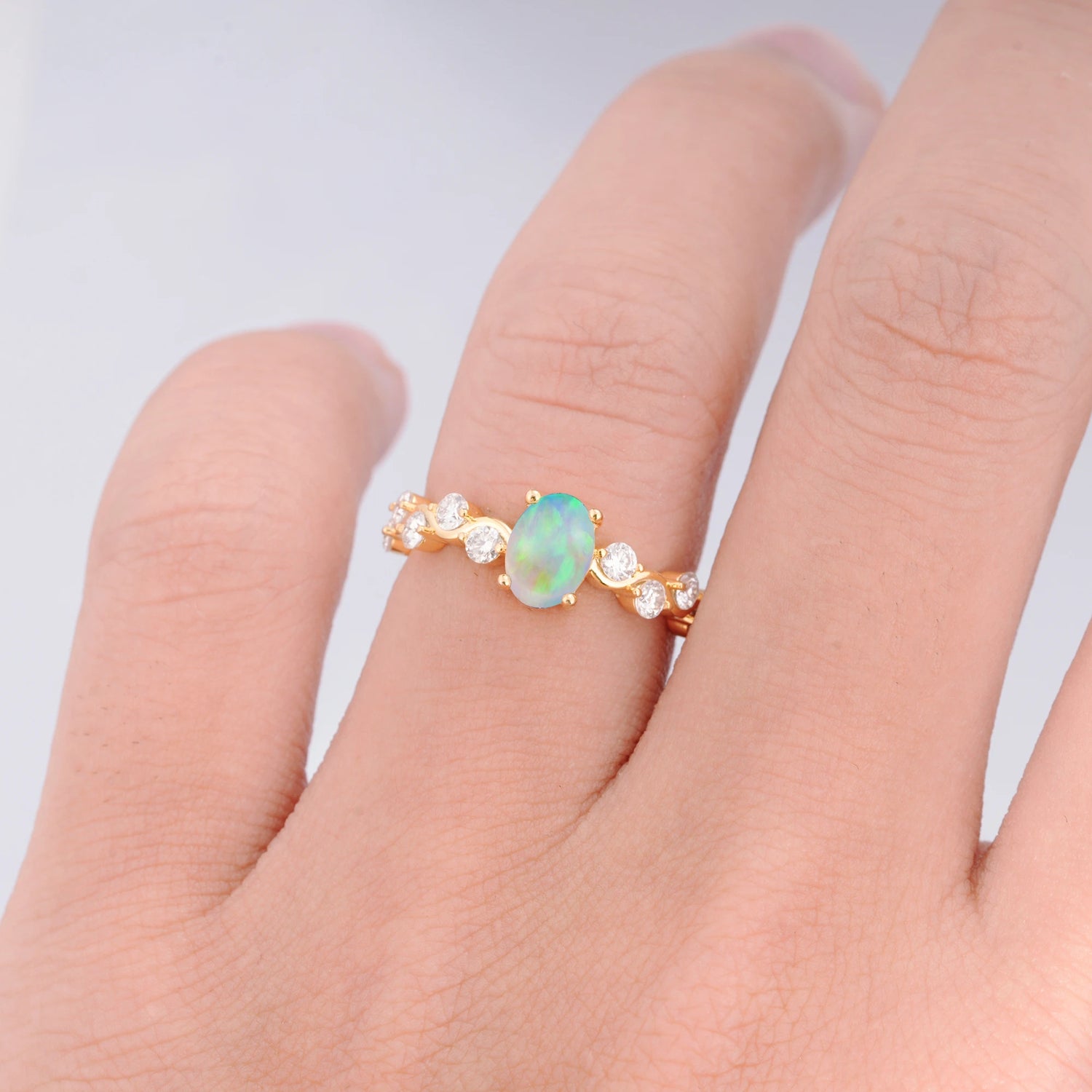 Unique Oval Opal Ring with Pave Set Stones