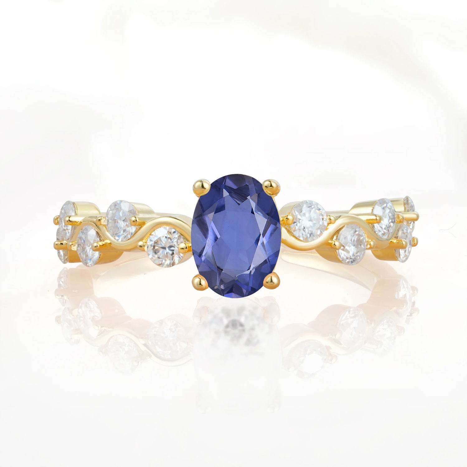 Unique Oval Tanzanite Ring with Pave Set Stones