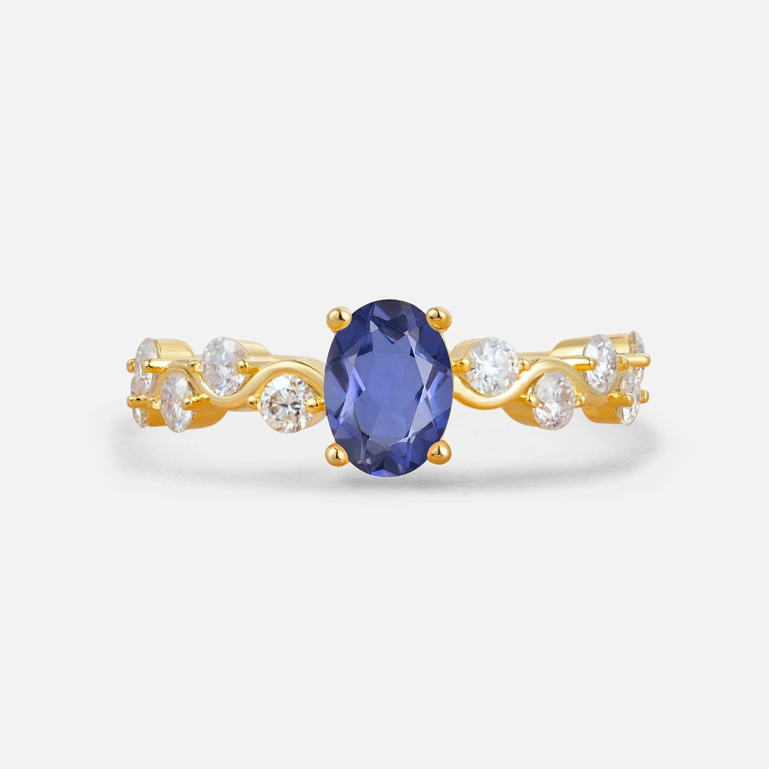 Unique Oval Tanzanite Ring with Pave Set Stones