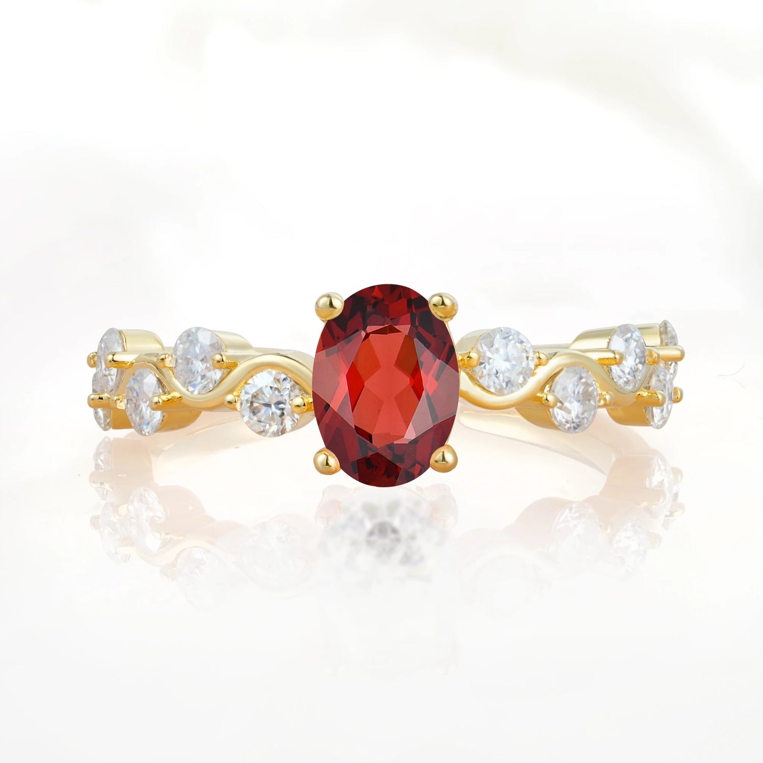 Unique Oval Garnet Ring with Pave Set Stones