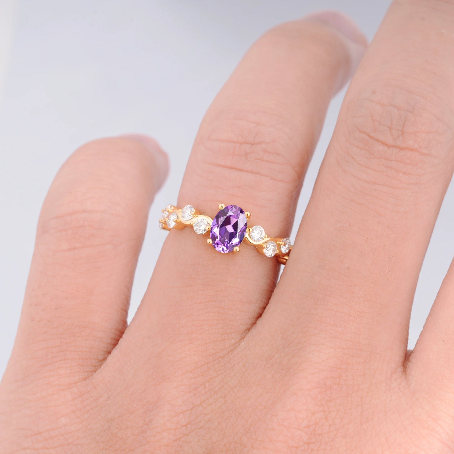 Unique Oval Amethyst Ring with Pave Set Stones