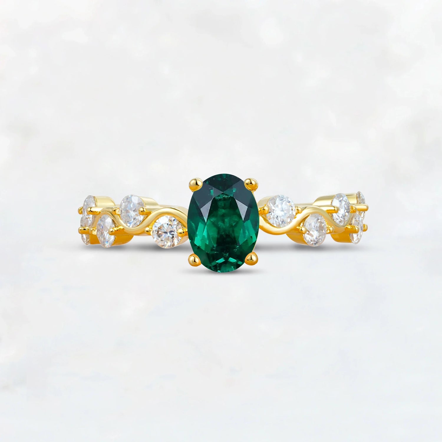 Unique Oval Emerald Ring with Pave Set Stones