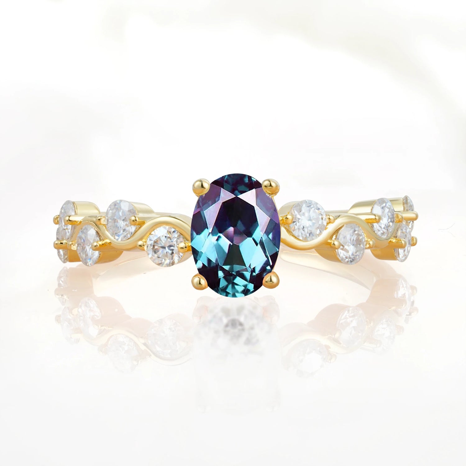 Unique Oval Alexandrite Ring with Pave Set Stones