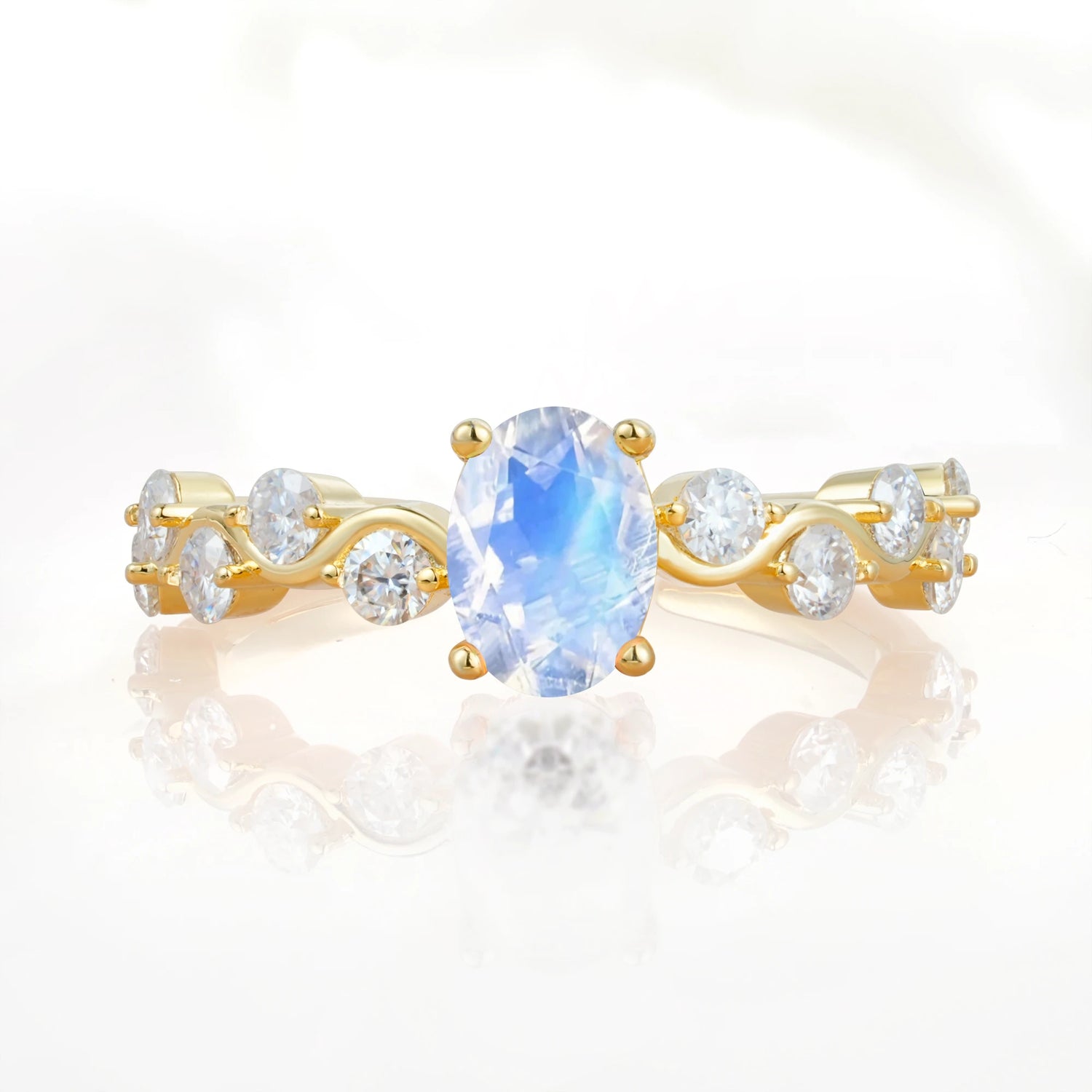 Unique Oval Moonstone Ring with Pave Set Stones