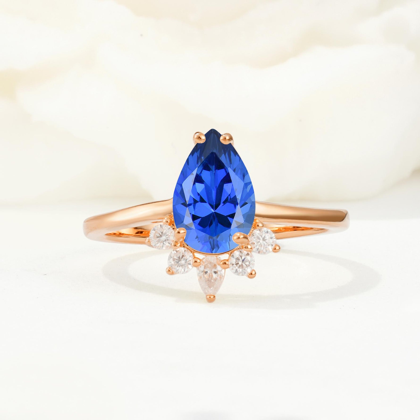 Pear Cut Sapphire Crown Engagement Ring with Accent Stones - Additional view