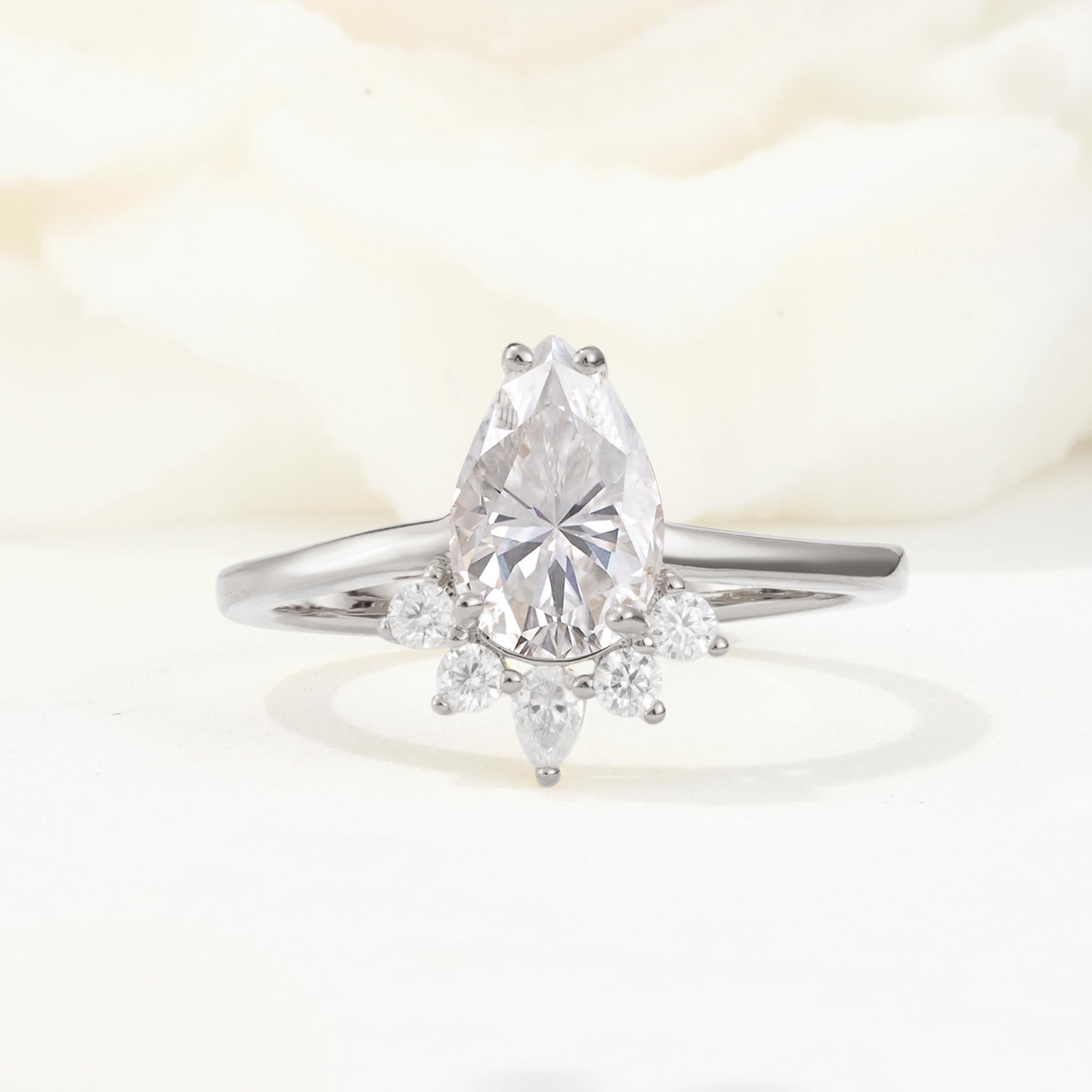 Pear Cut Moissanite Crown Engagement Ring with Accent Stones - Additional view