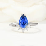 Pear Cut Sapphire Crown Engagement Ring with Accent Stones - Additional view