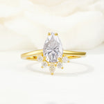 Pear Cut Moissanite Crown Engagement Ring with Accent Stones - Additional view