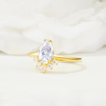 Pear Cut Moissanite Crown Engagement Ring with Accent Stones - Additional view