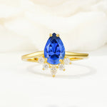 Pear Cut Sapphire Crown Engagement Ring with Accent Stones - Additional view