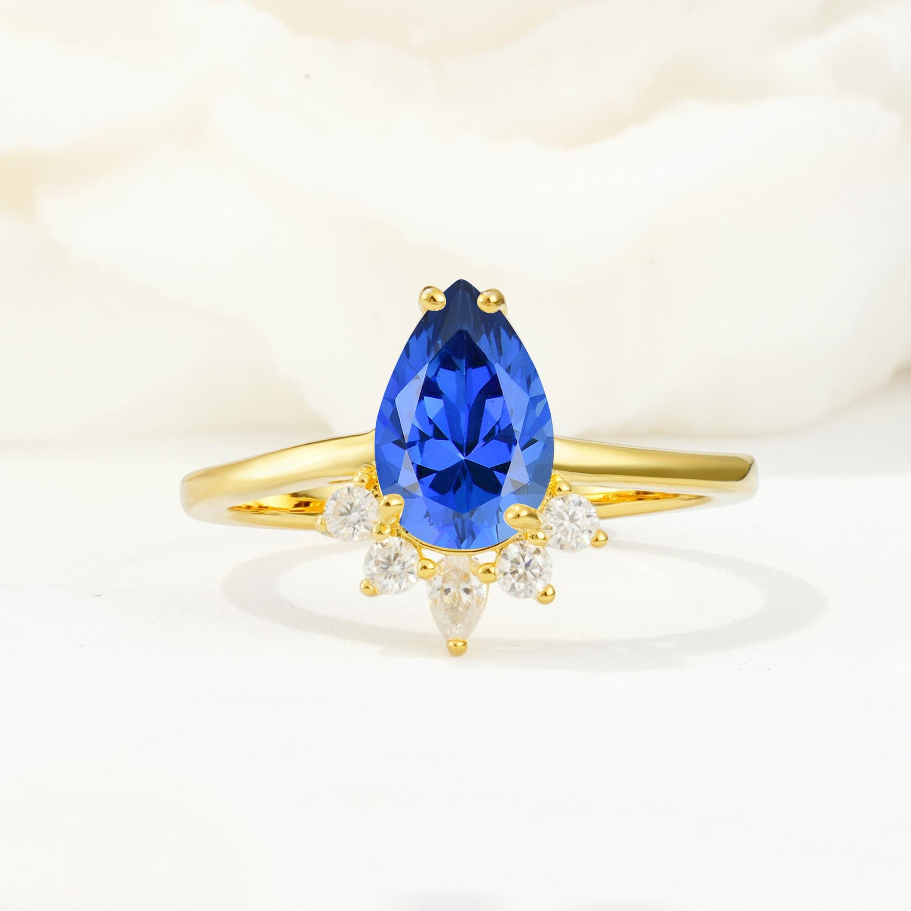 Pear Cut Sapphire Crown Engagement Ring with Accent Stones - Additional view