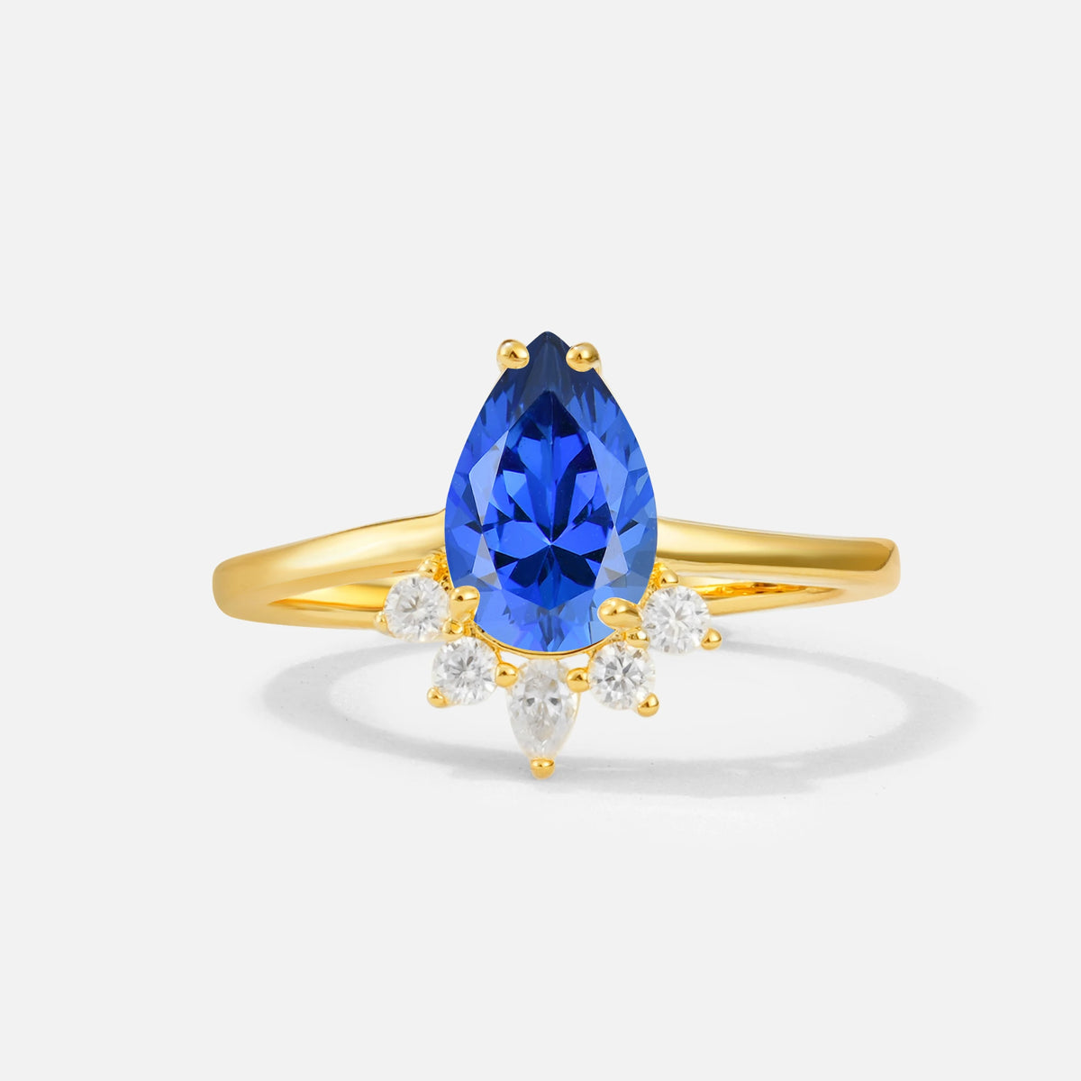 Pear Cut Sapphire Crown Engagement Ring with Accent Stones