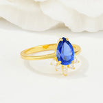 Pear Cut Sapphire Crown Engagement Ring with Accent Stones - Additional view