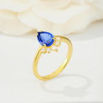 Pear Cut Sapphire Crown Engagement Ring with Accent Stones - Additional view
