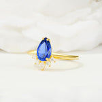 Pear Cut Sapphire Crown Engagement Ring with Accent Stones - Additional view