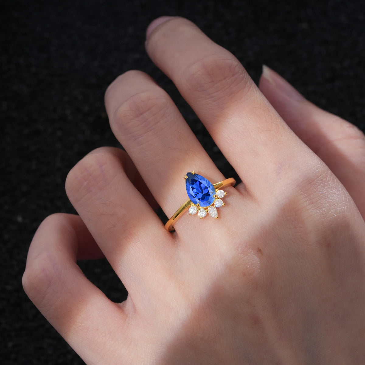 Pear Cut Sapphire Crown Engagement Ring with Accent Stones