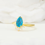 Pear Cut Turquoise Crown Engagement Ring with Accent Stones - Additional view