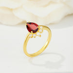 Pear Cut Garnet Crown Engagement Ring with Accent Stones - Additional view