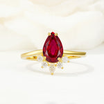 Pear Cut Ruby Crown Engagement Ring with Accent Stones - Additional view