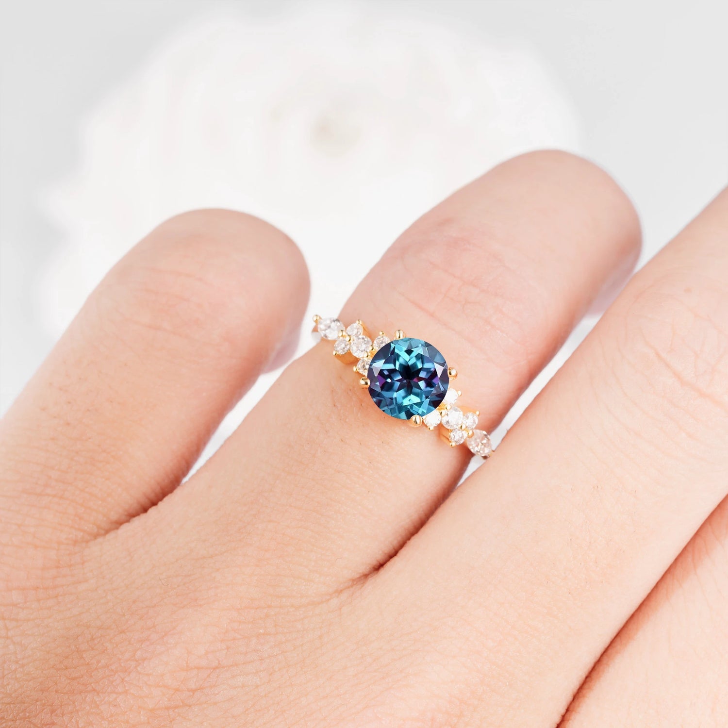 Round Cut Alexandrite Engagement Ring with Floral Side Stone Design