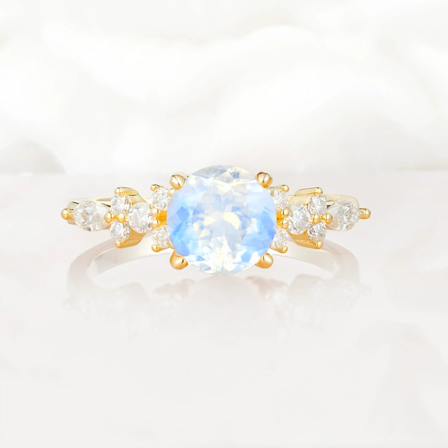 Round Cut Moonstone Engagement Ring with Floral Side Stone Design