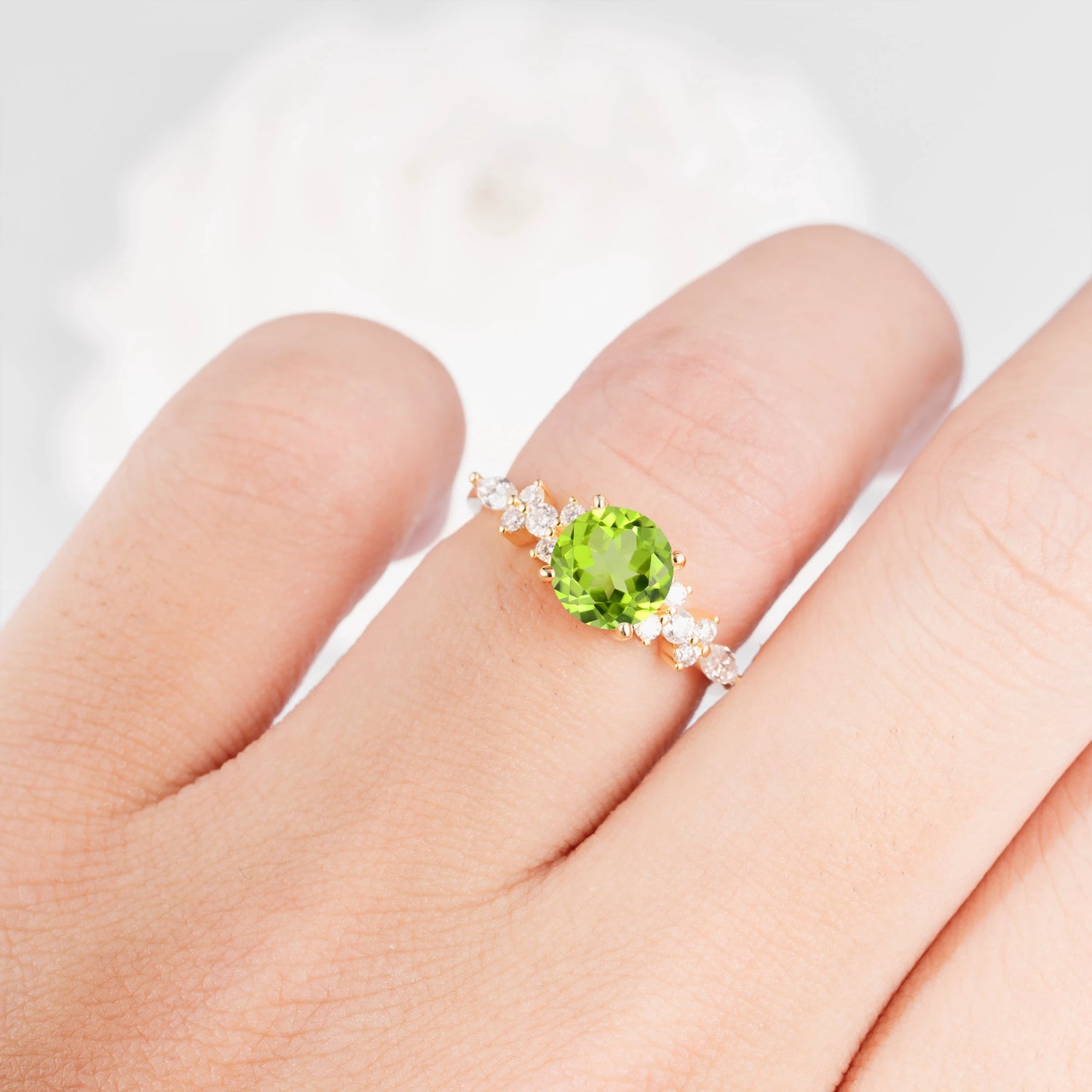 Round Cut Peridot Engagement Ring with Floral Side Stone Design