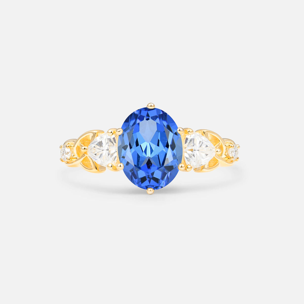 Romantic Three-Stone Oval Sapphire  Engagement Ring with Pear & Round Accents