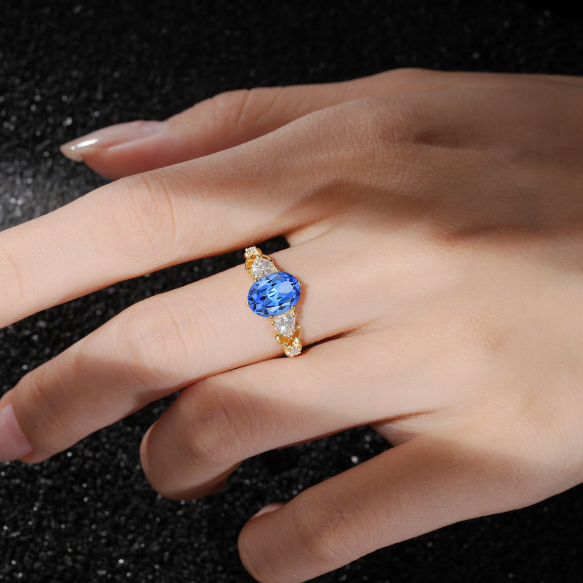 Romantic Three-Stone Oval Sapphire  Engagement Ring with Pear & Round Accents