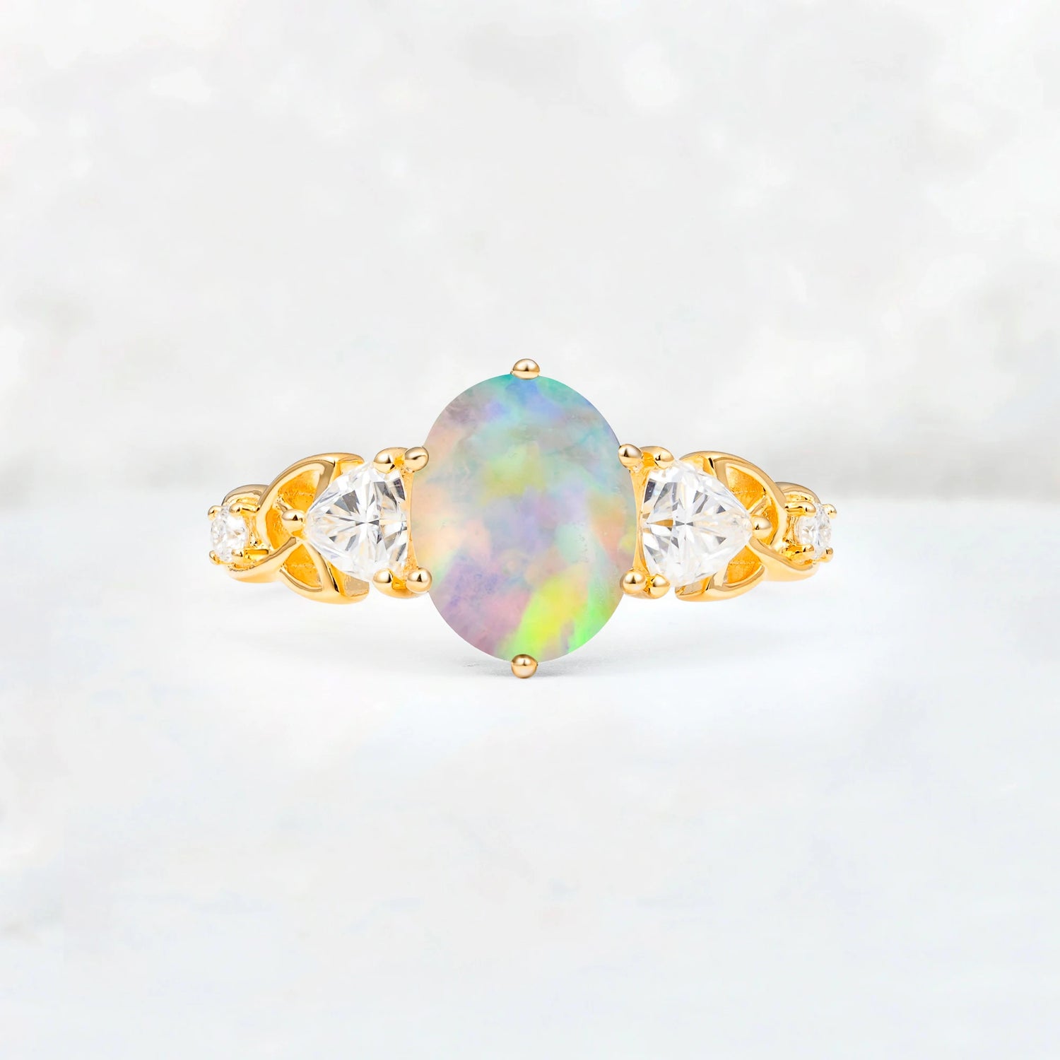 Elegant Oval Cut Trillion Side Accent Fire Opal Engagement Ring