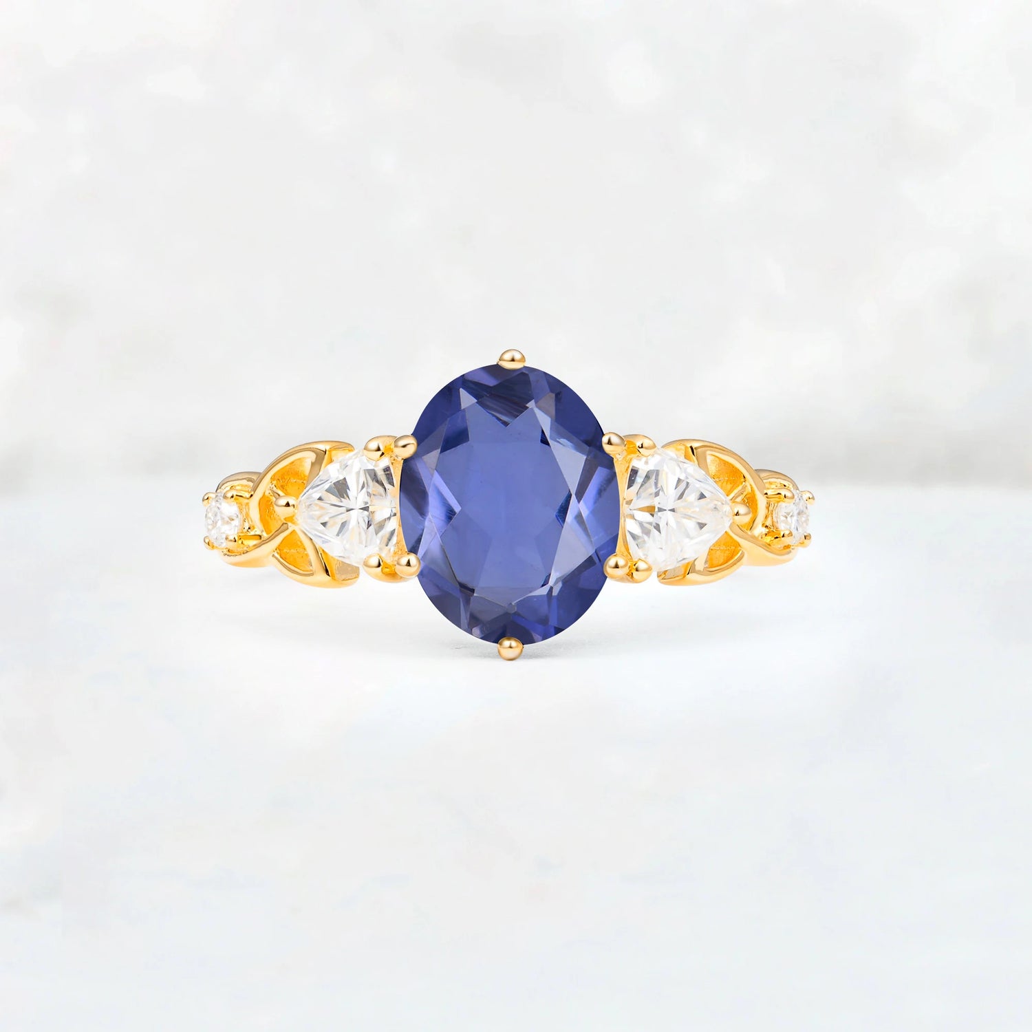 Elegant Oval Cut Trillion Side Accent Tanzanite Engagement Ring