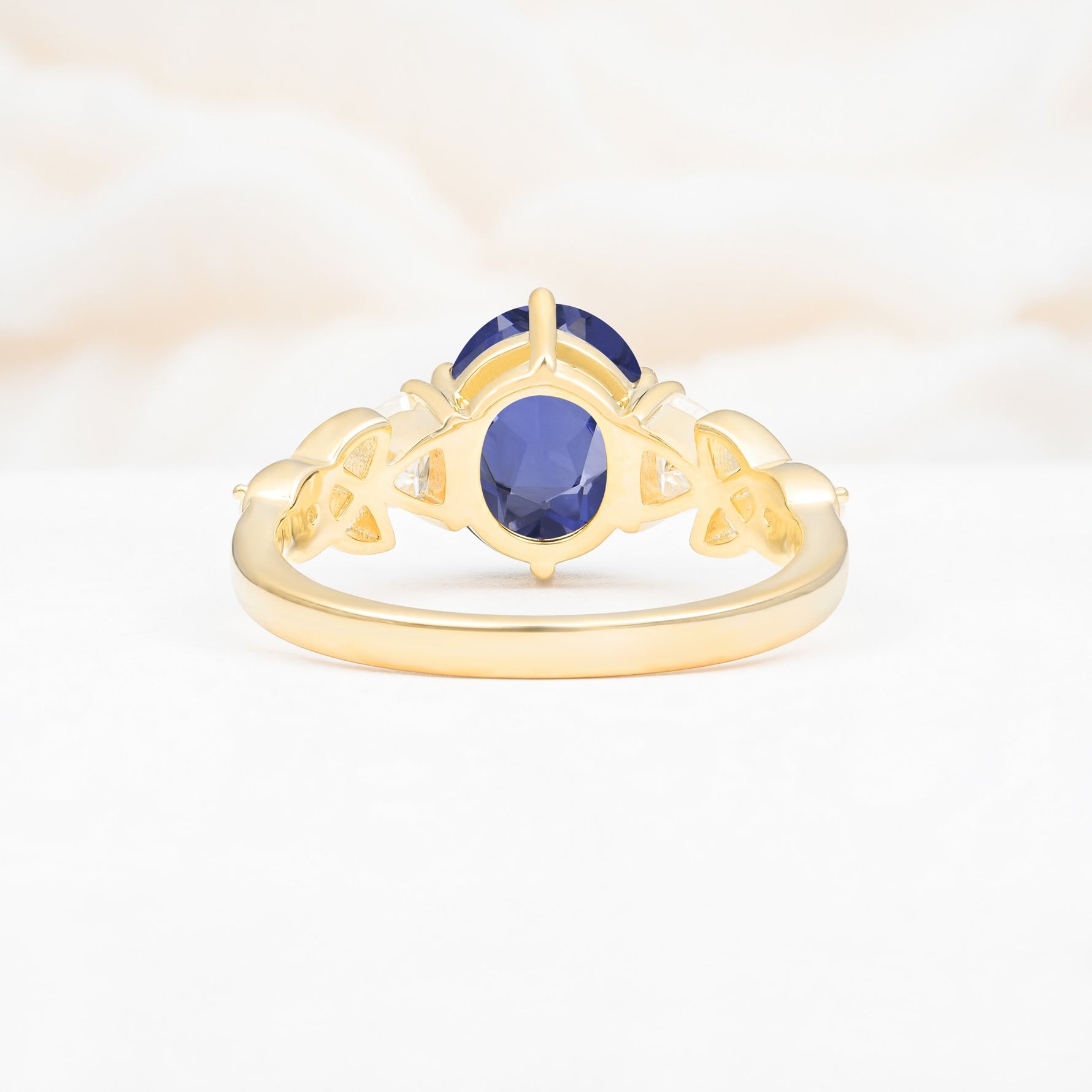 Elegant Oval Cut Trillion Side Accent Tanzanite Engagement Ring - Additional view