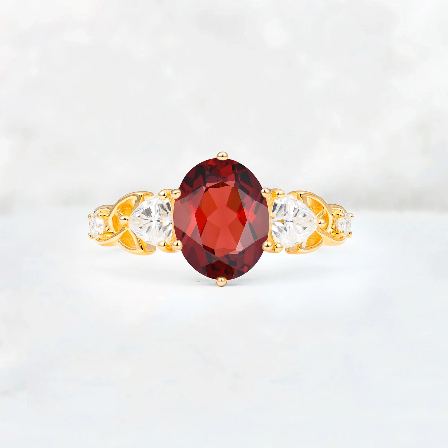 Elegant Oval Cut Trillion Side Accent Garnet Engagement Ring