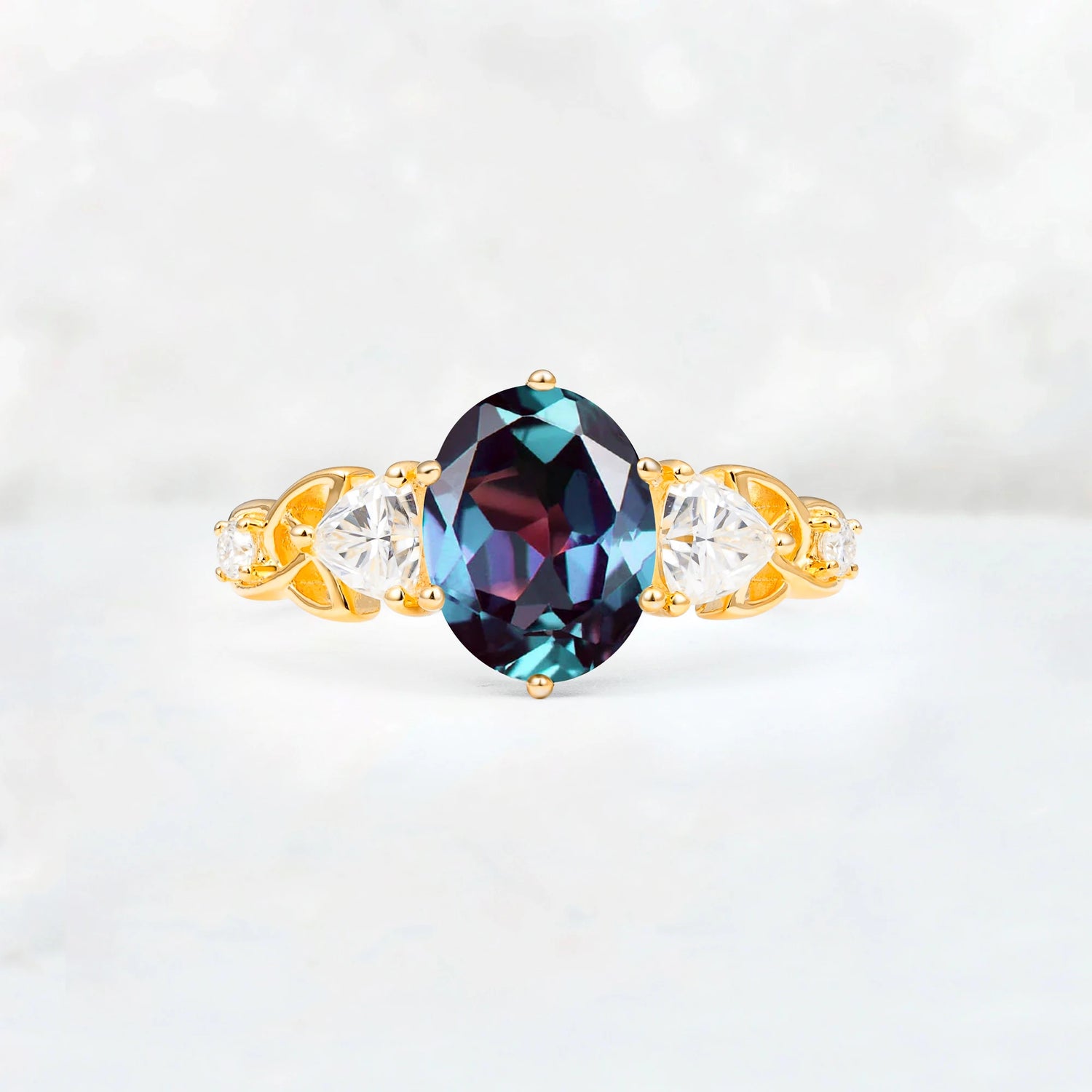 Elegant Oval Cut Trillion Side Accent Alexandrite Engagement Ring