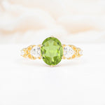 Elegant Oval Cut Trillion Side Accent Peridot Engagement Ring - Additional view