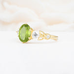 Elegant Oval Cut Trillion Side Accent Peridot Engagement Ring - Additional view