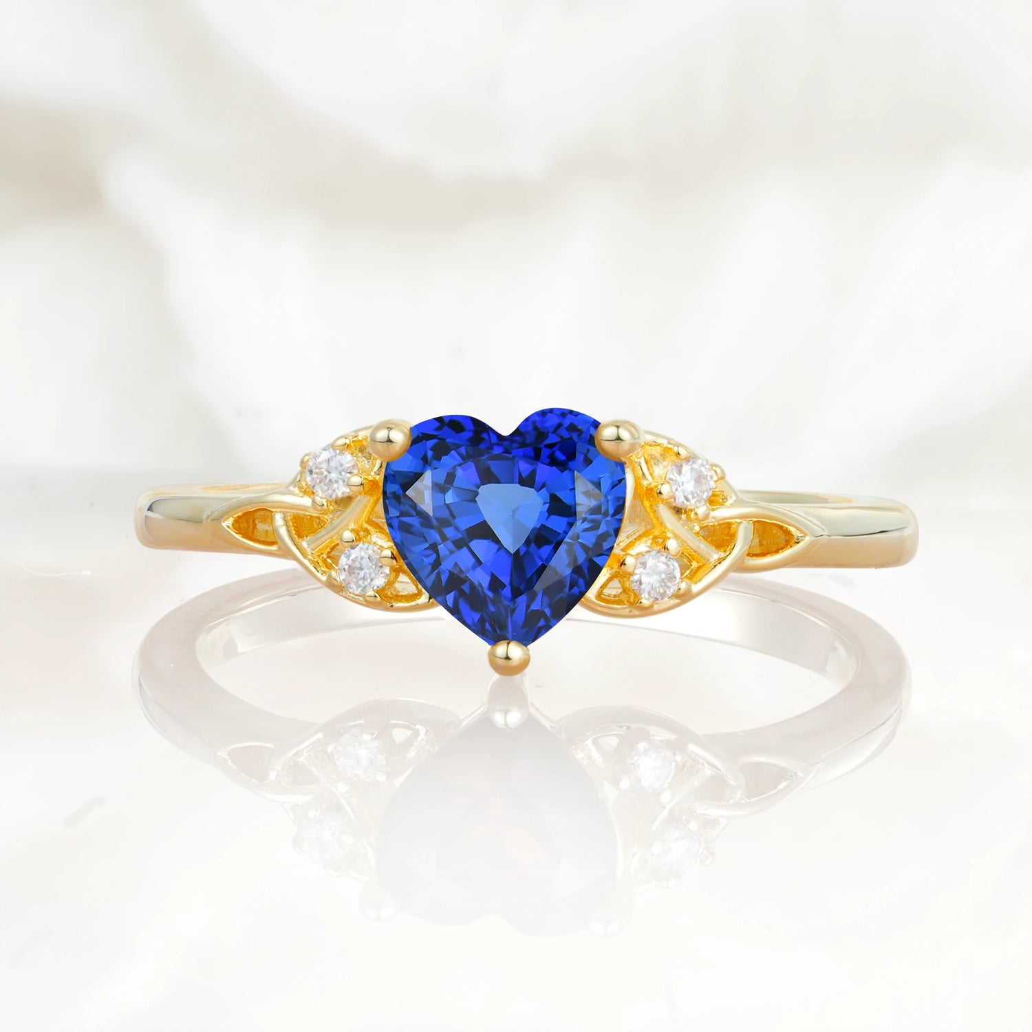 Vintage Heart-Shaped Sapphire Ring with Side Stone