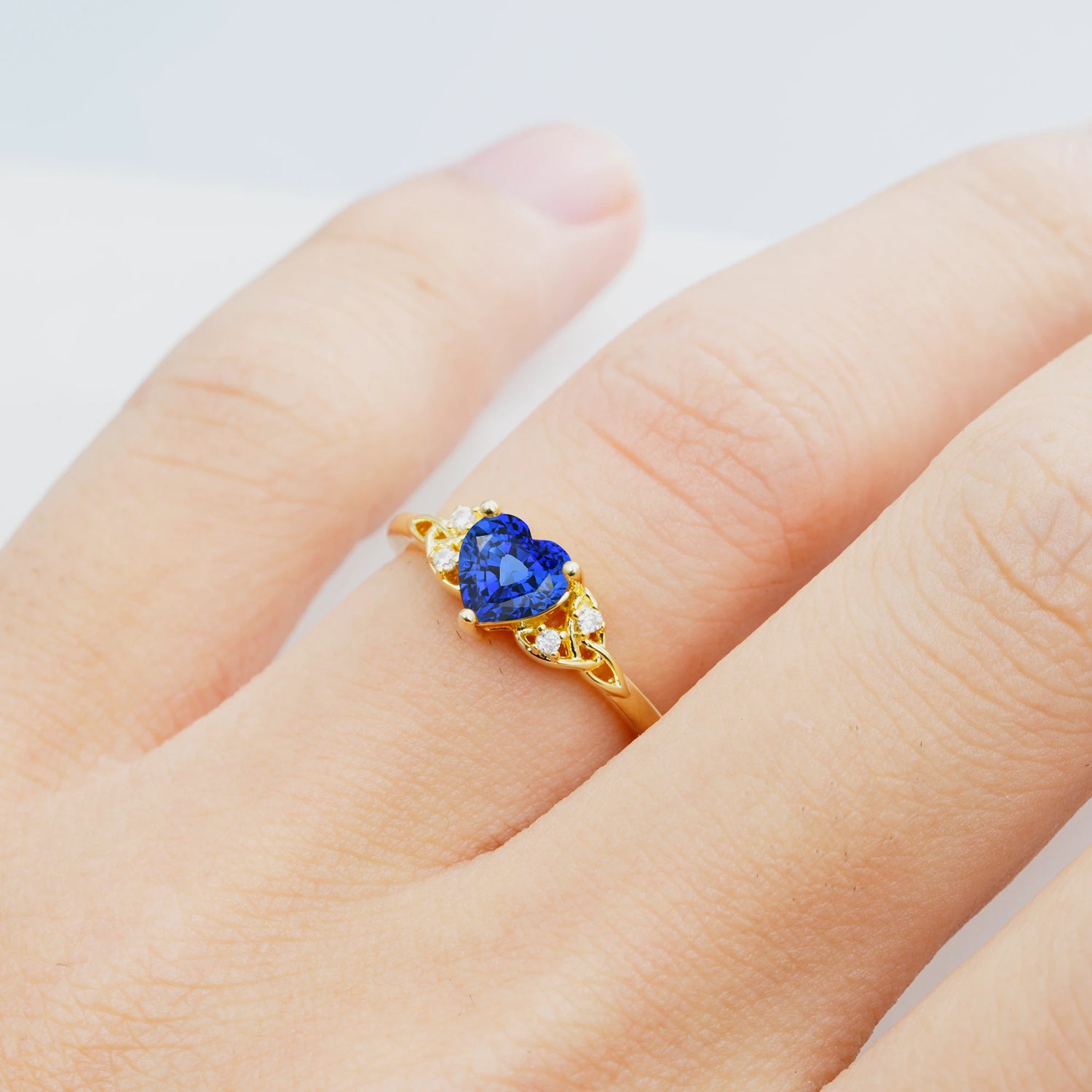 Vintage Heart-Shaped Sapphire Ring with Side Stone