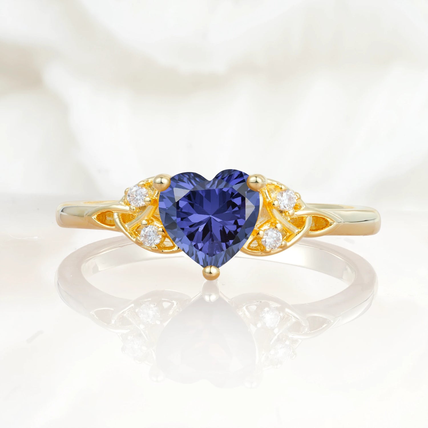 Vintage Heart-Shaped Tanzanite Ring with Side Stone