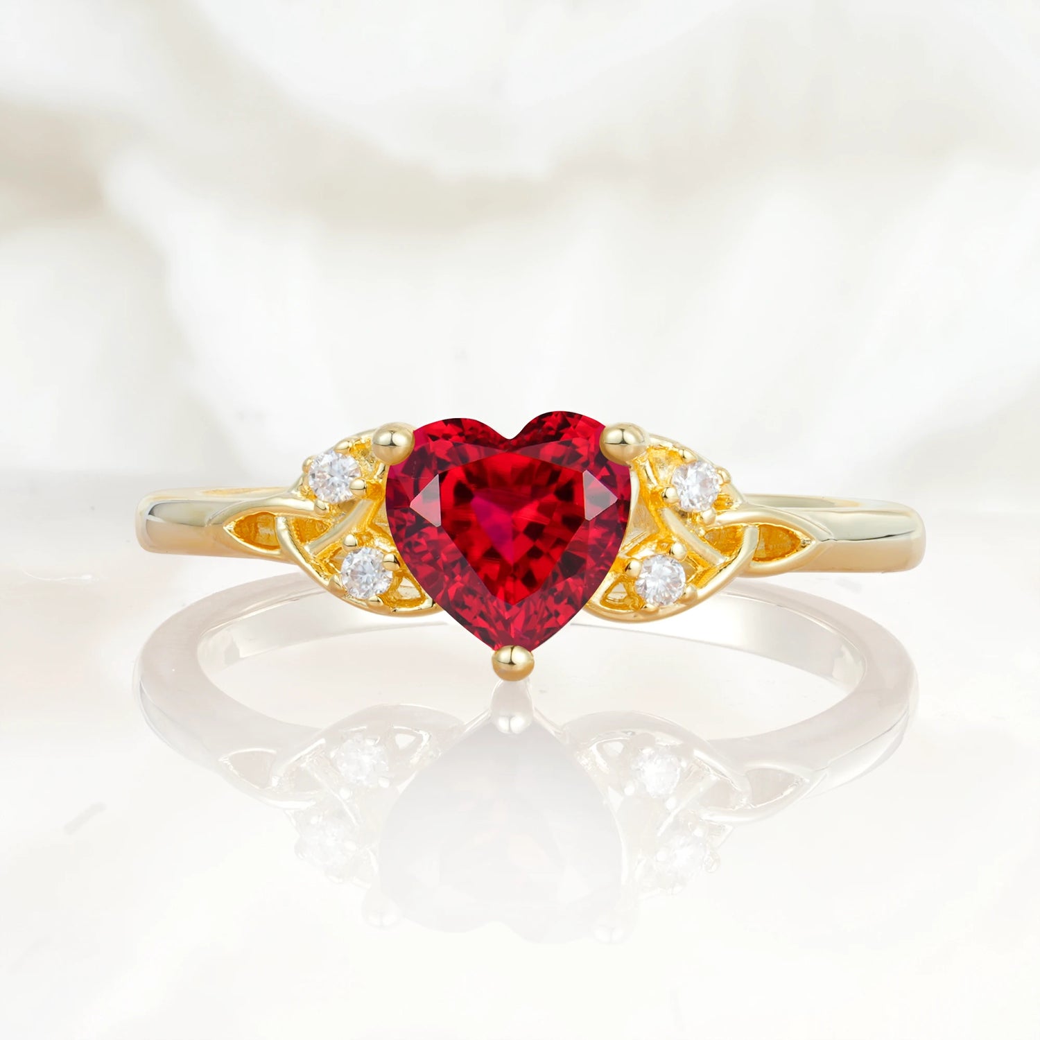 Vintage Heart-Shaped Ruby Ring with Side Stone