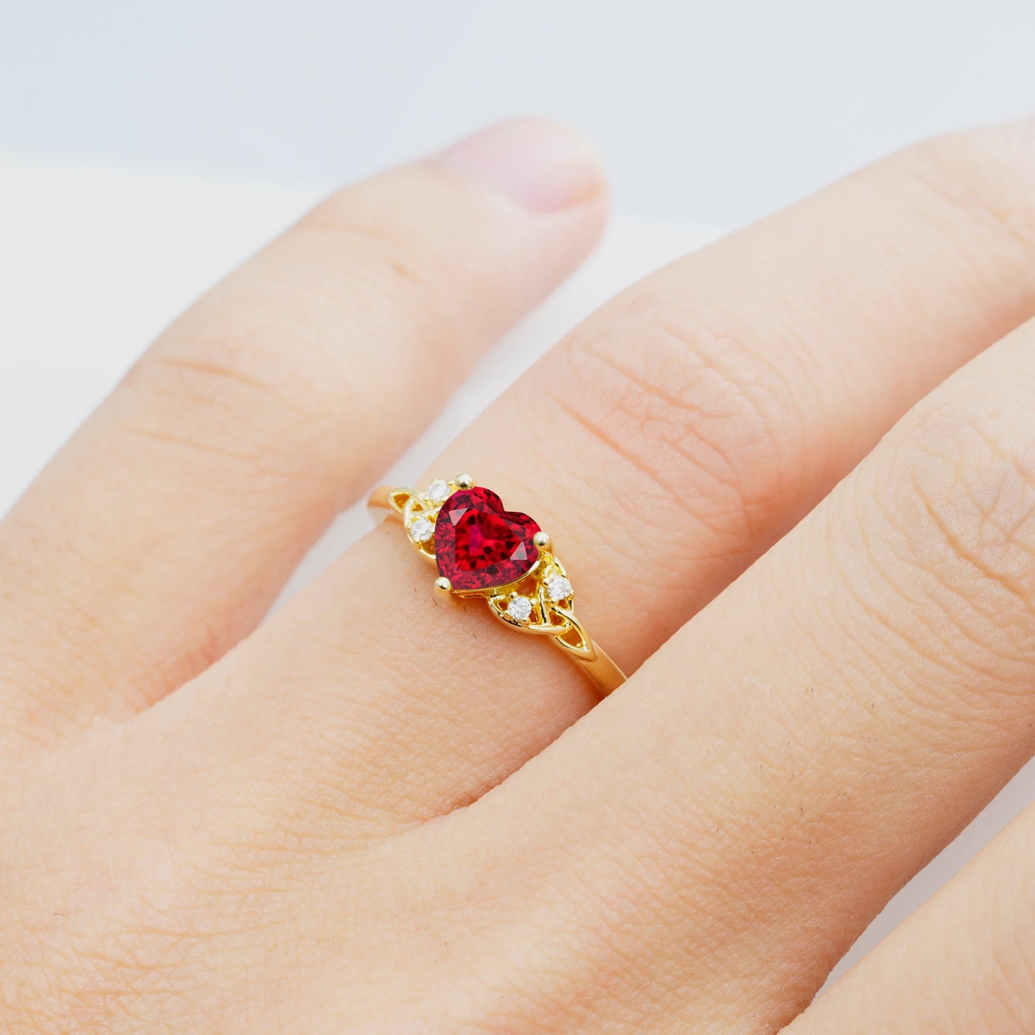 Vintage Heart-Shaped Ruby Ring with Side Stone