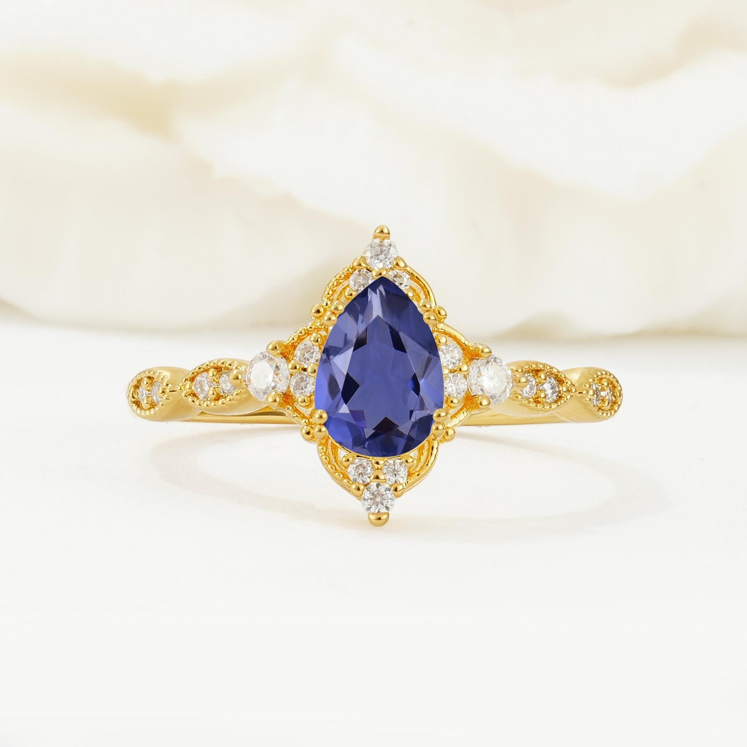 Vintage Pear Cut Tanzanite Scalloped Halo Engagement Ring - Additional view