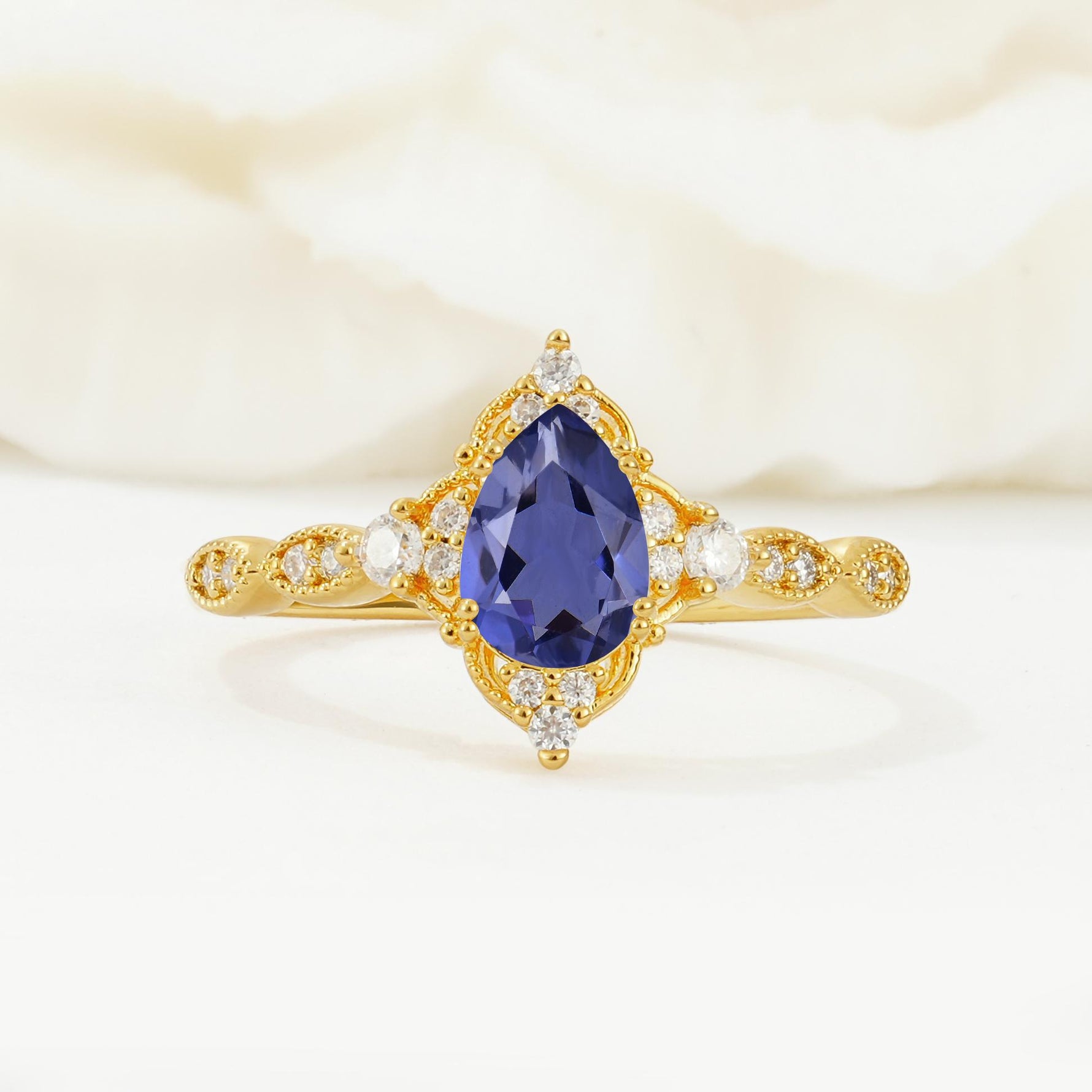 Vintage Pear Cut Tanzanite Scalloped Halo Engagement Ring - Additional view