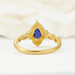 Vintage Pear Cut Tanzanite Scalloped Halo Engagement Ring - Additional view