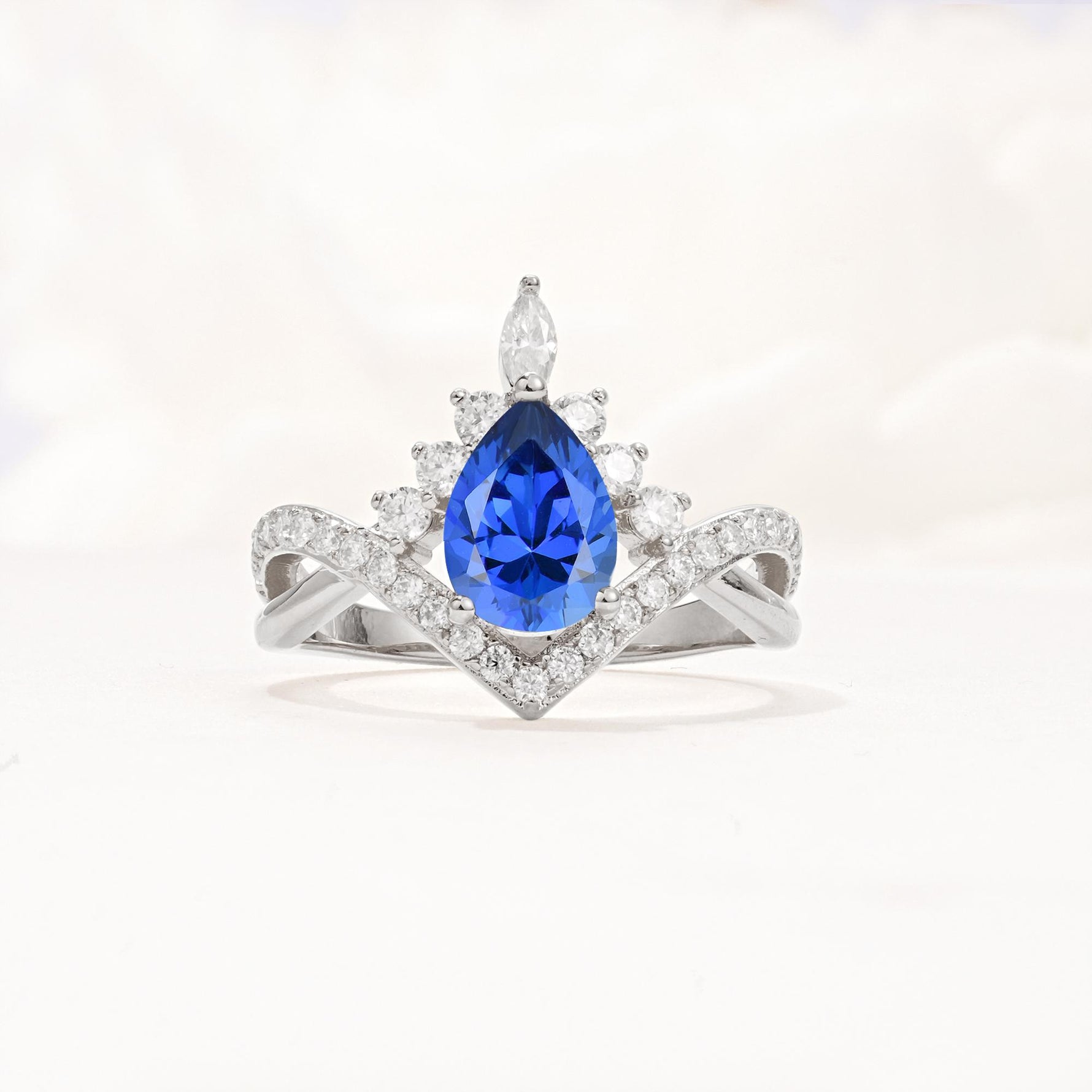 Pear Cut Sapphire Crown Engagement Ring with Chevron Band - Additional view