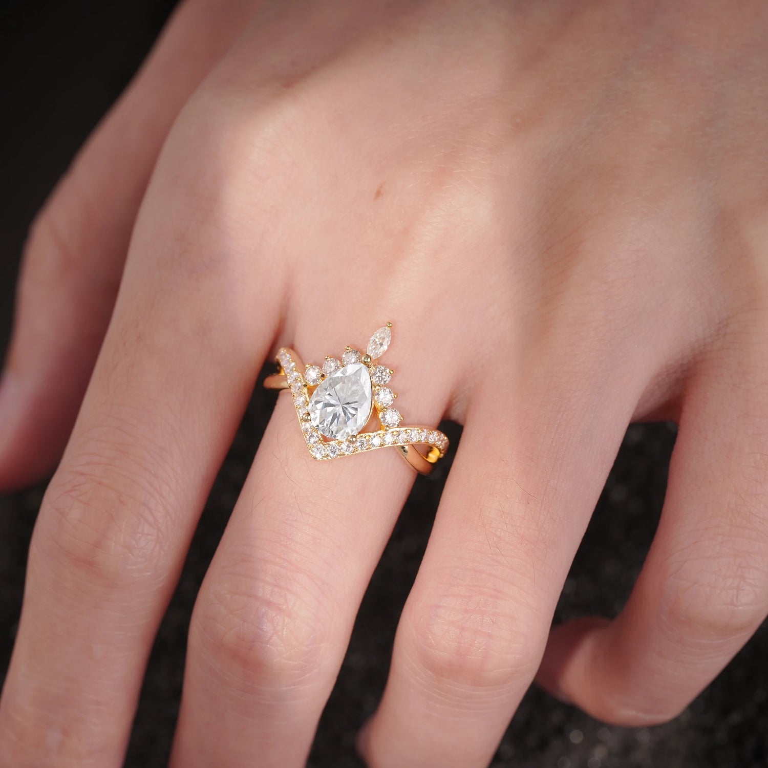 Pear Cut Moissanite Crown Engagement Ring with Chevron Band
